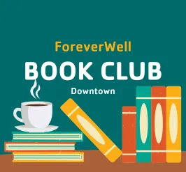 A stack of books with a cup of coffee resting on it. 