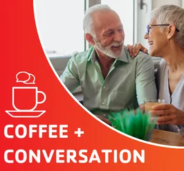 An older couple engaged in conversation.