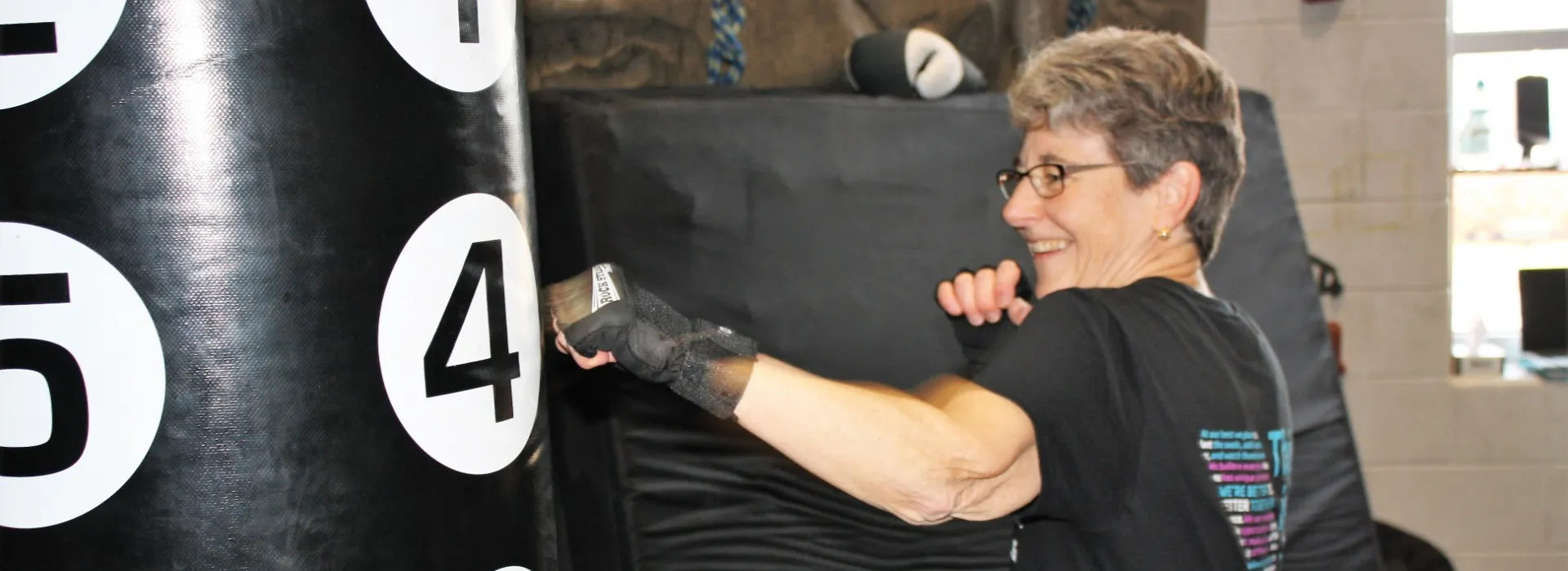 A Y member participating in Rock Steady boxing