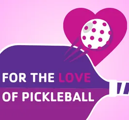A pink and purple pickleball paddle with a pickleball bouncing off of it, and landing on a heart shape. The text reads, "for the love of pickleball."